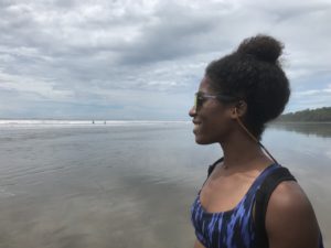 Knockaround Sunglasses Review - katie smile looking at ocean