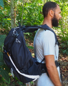 how to put on your backpack properly - before tightening shoulder straps