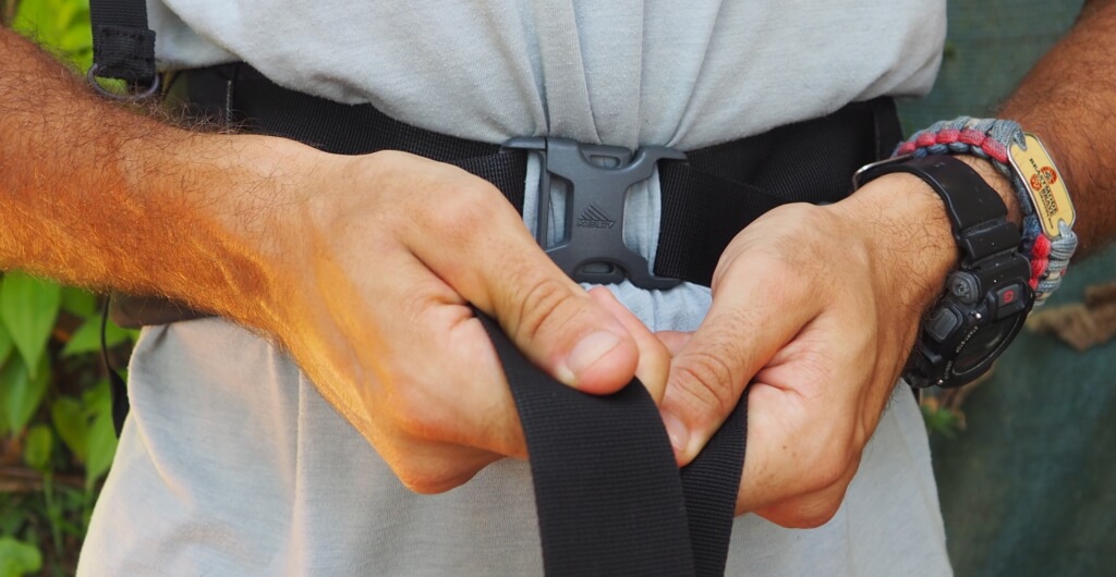 how to put your backpack on properly - start with the hip belt