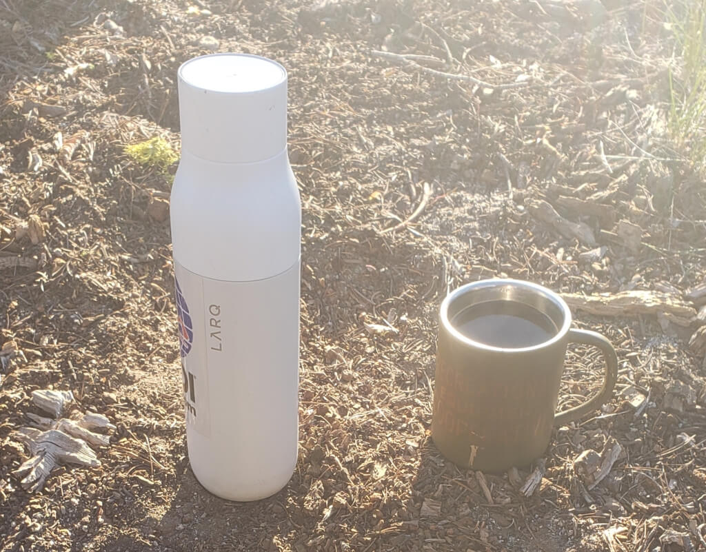 Larq Self Cleaning Water Bottle - in action backpacking