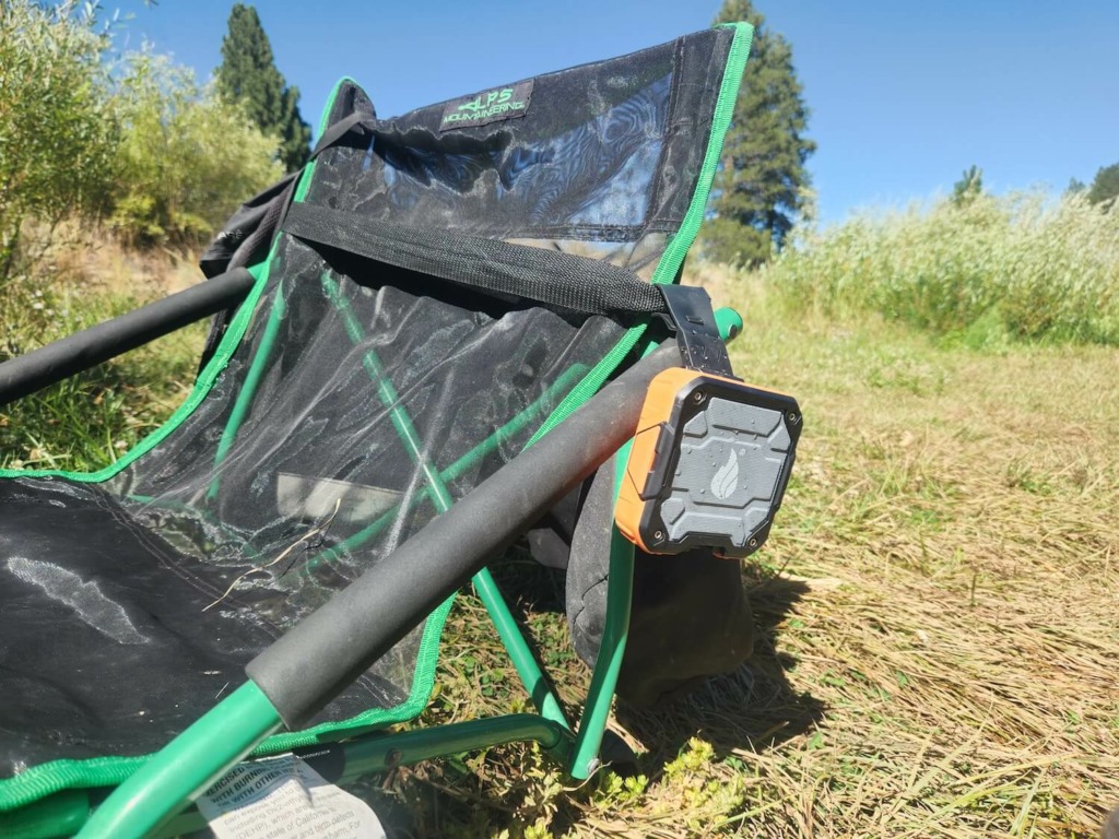 blackfire portable waterproof speaker hanging from camp chair