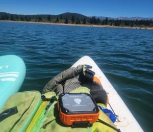 blackfire portable waterproof speaker on paddleboard