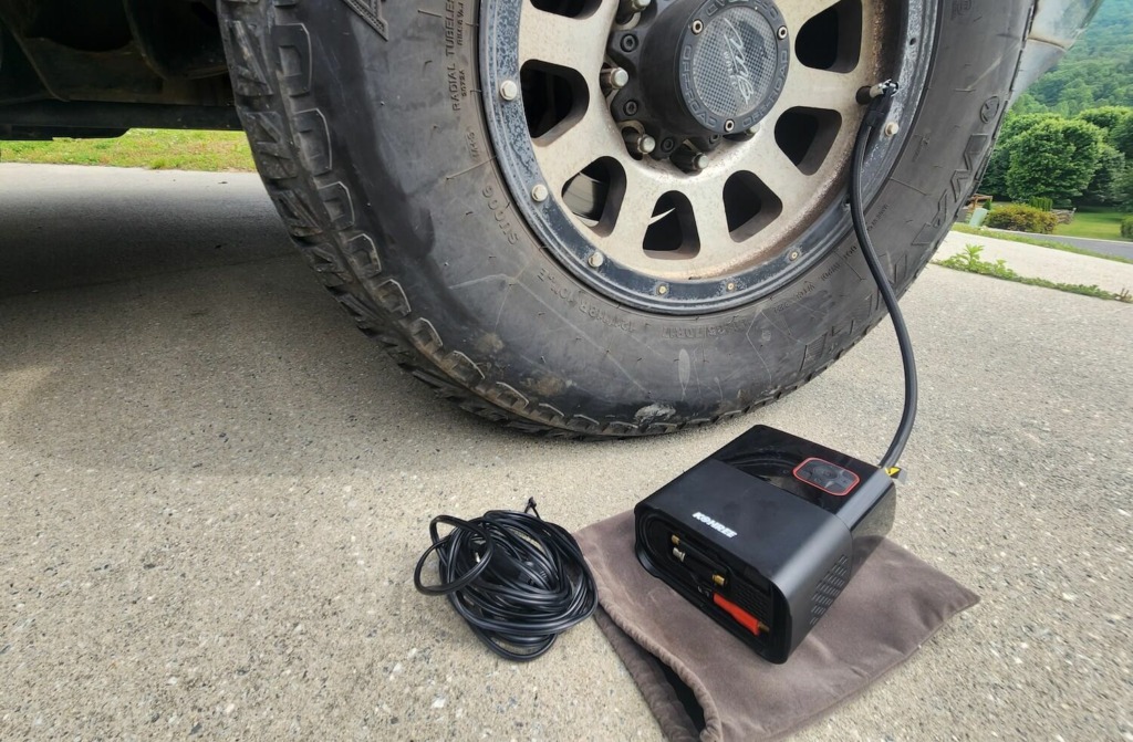 Tire Inflator connected to truck tire