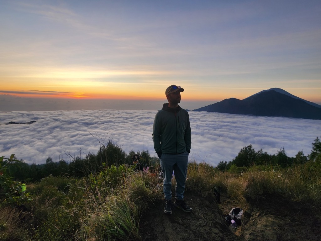 Sunrise on Mt Batur with man wearing Skyline trail joggers from Outdoor Vitals